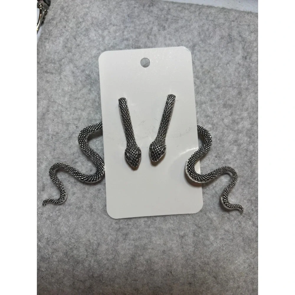#52. Silver-colored Snake Jacket Earrings